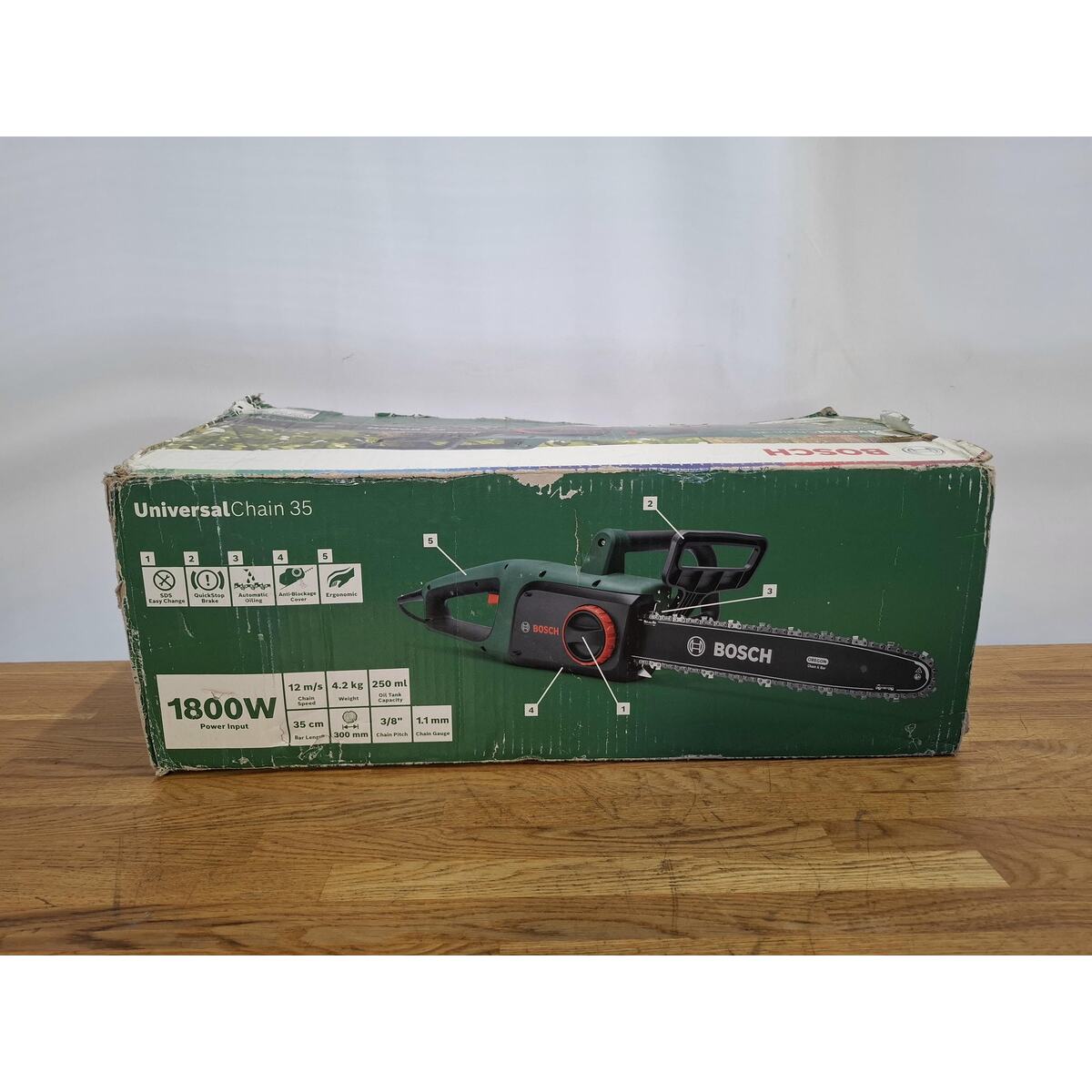 Электрическая цепная пила Bosch UniversalChain 35 (Цвет: Green)