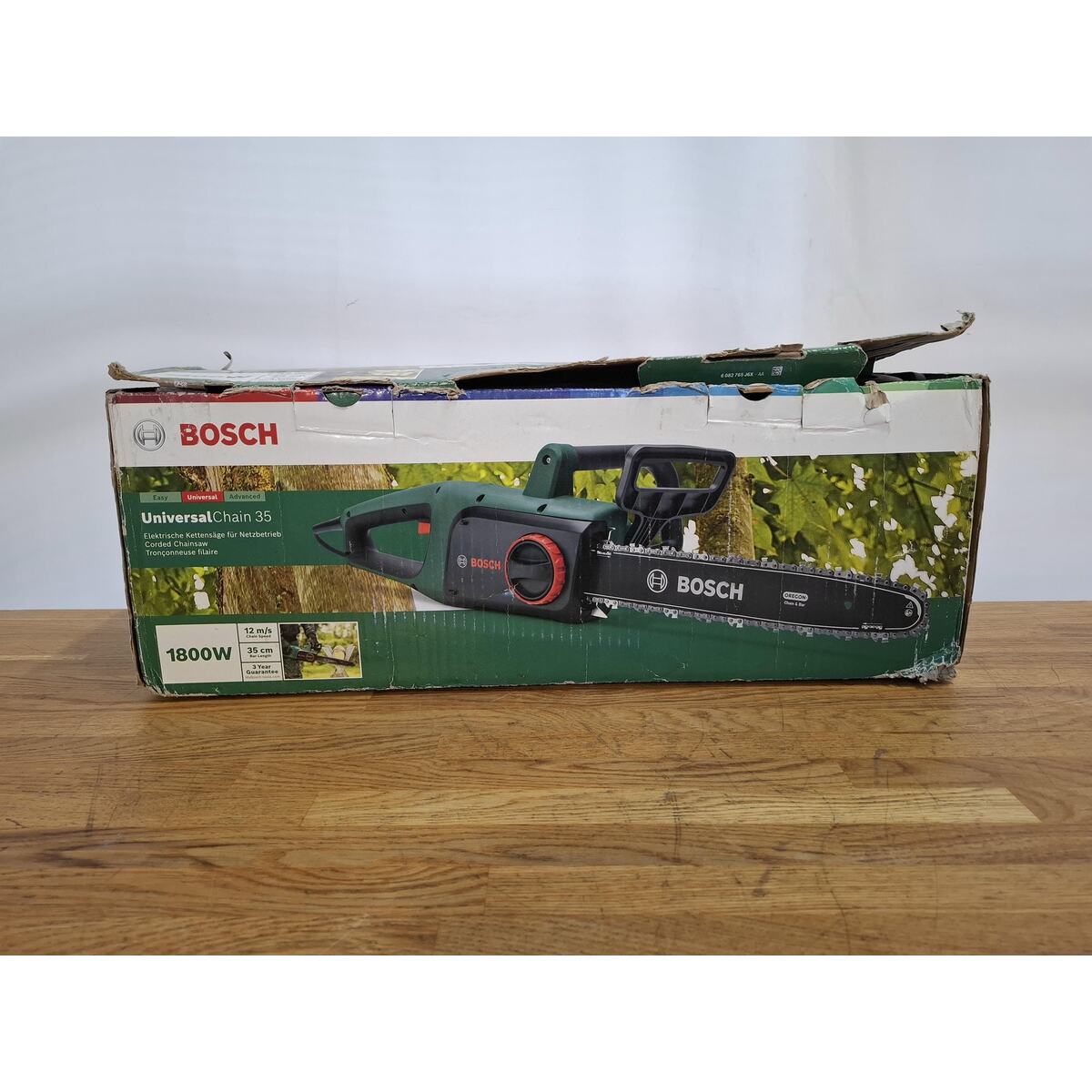 Электрическая цепная пила Bosch UniversalChain 35 (Цвет: Green)