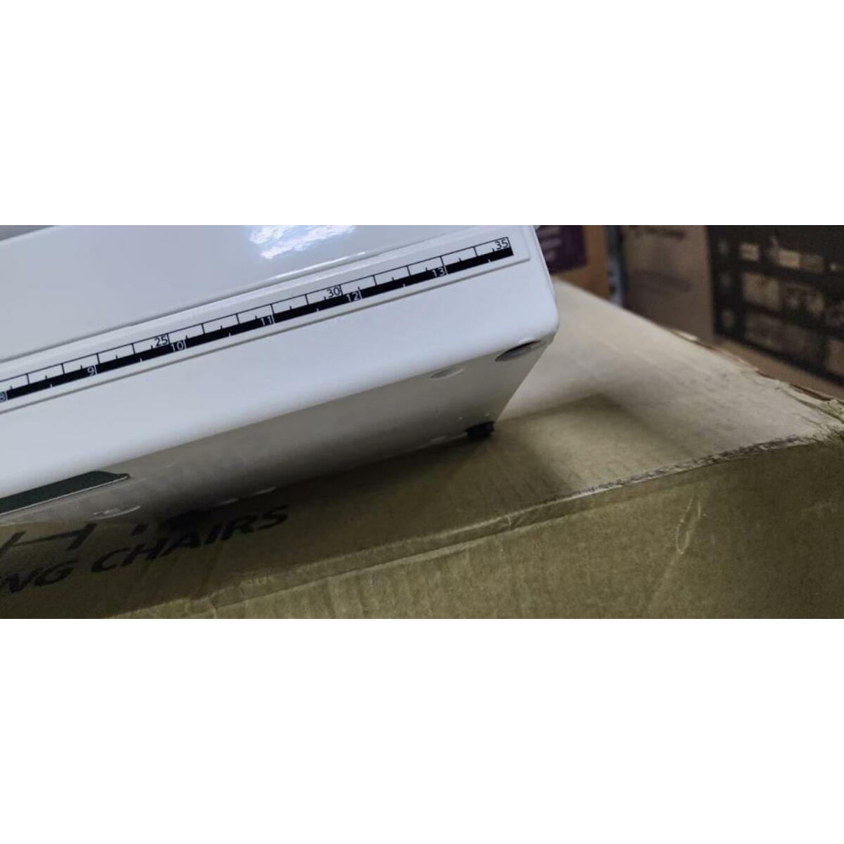 Швейная машина Janome 394 (Цвет: White)