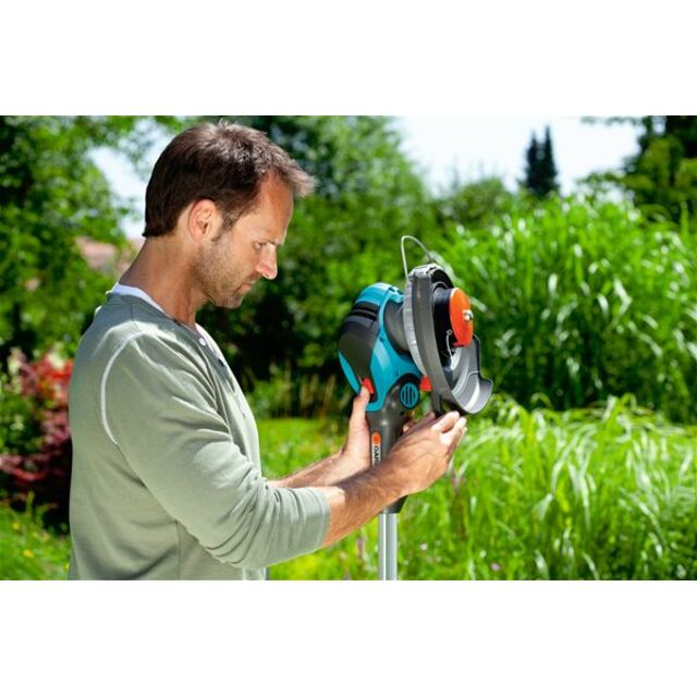 Триммер электрический Gardena ComfortCut 450 / 25 (Цвет: Blue) Триммер электрический Gardena ComfortCut 450 / 25 (Цвет: Blue)