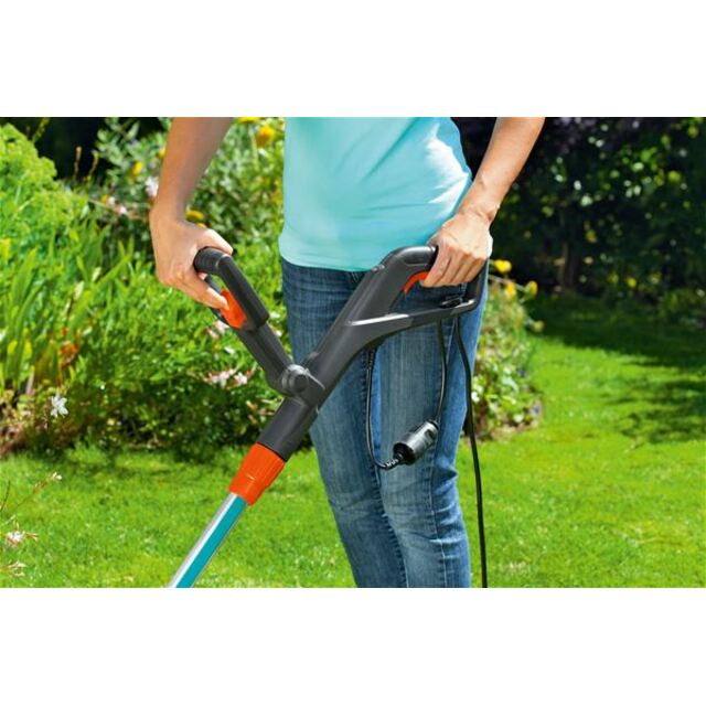 Триммер электрический Gardena ComfortCut 450 / 25 (Цвет: Blue) Триммер электрический Gardena ComfortCut 450 / 25 (Цвет: Blue)